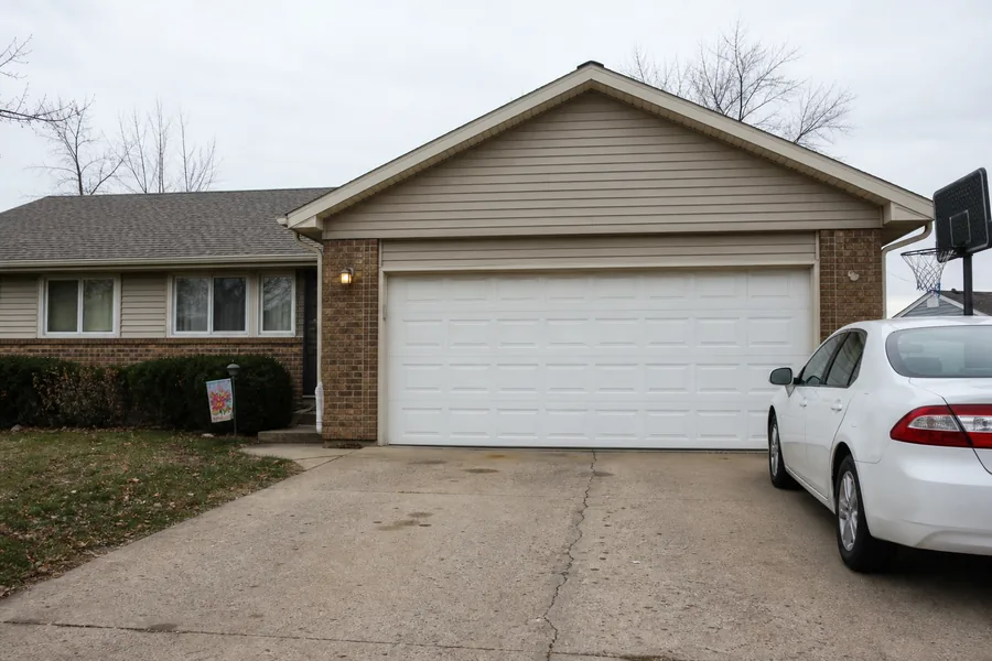A house with an attached garage in Omaha, NE